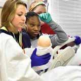 BCYC Immersion participants learn how to care for a woman in labor and for her newborn child