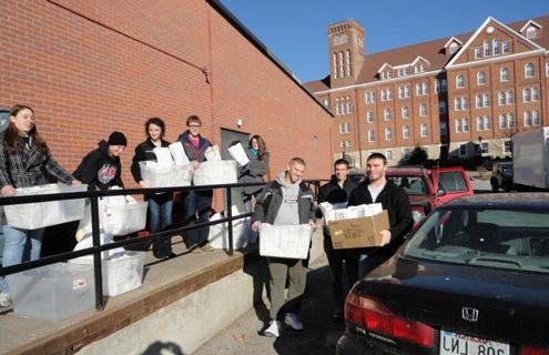Students deliver lunches provided by the Skip a Meal program